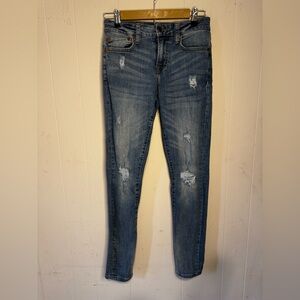 Mid-Wash Distressed Women's Skinny Jeans
